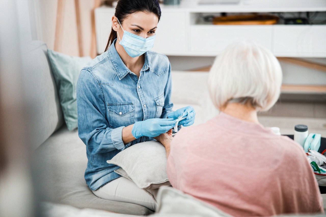 Female Doctor Doing a Check up on a Senior Woman | Advance Care Planning​ | Legacy Law Group