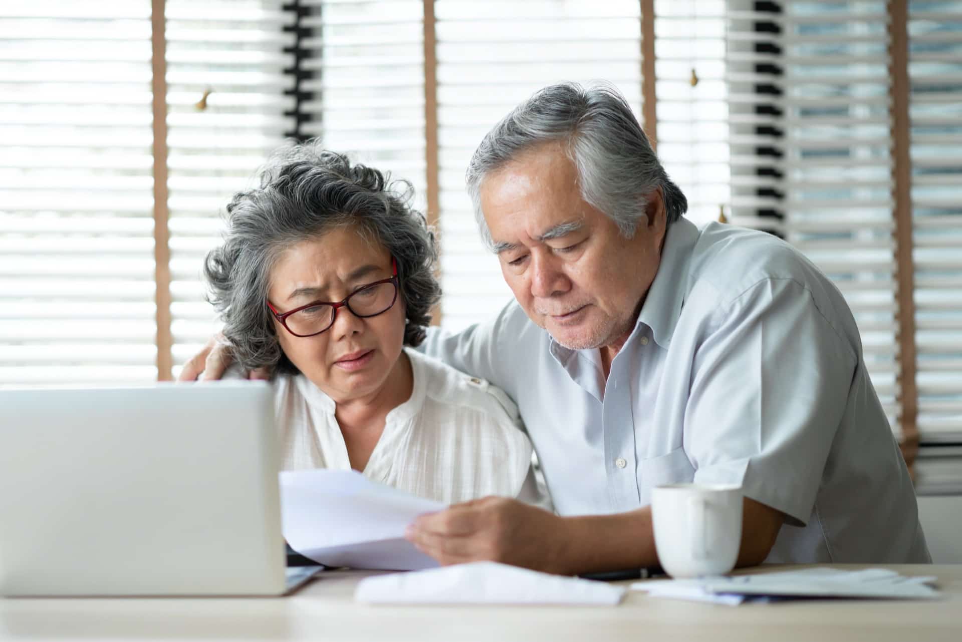 Senior Couple Calculate Their Monthly Expense | Medicaid Planning Attorney​ | Legacy Law Group