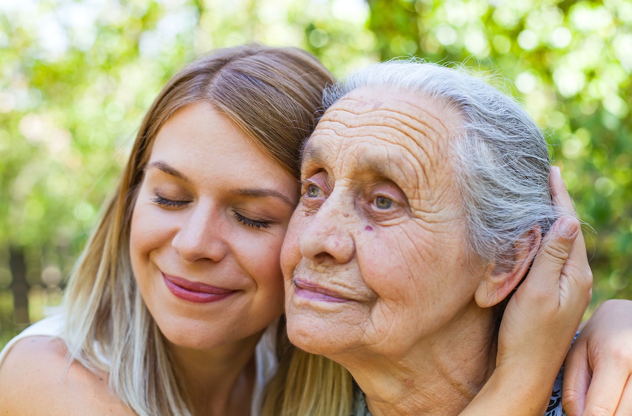 Hugging Grandma with Alzheimers | Long Term Care Planning​​ in Washington | Legacy Law Group
