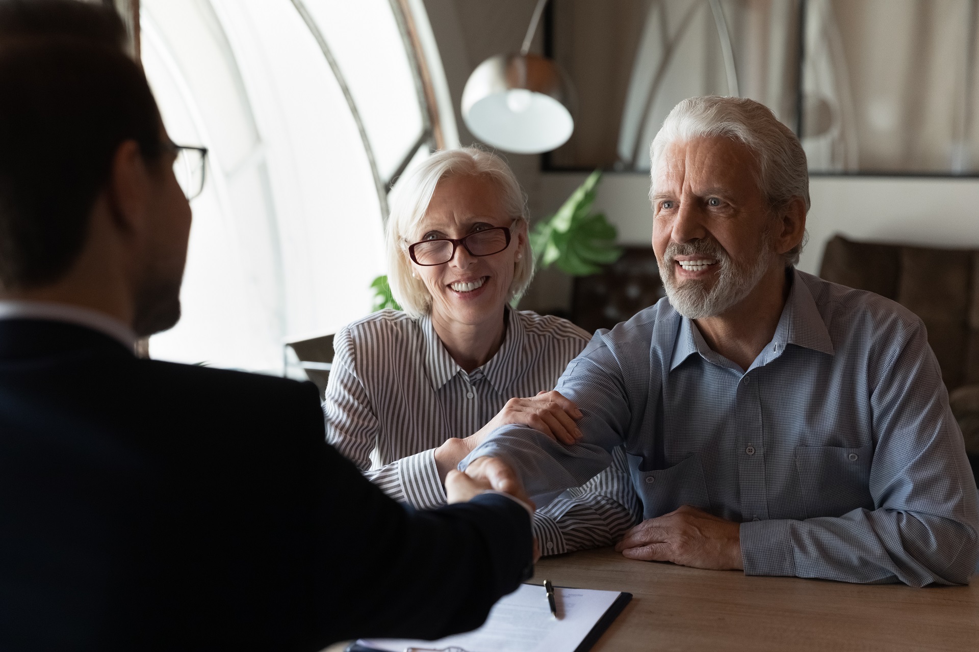 Elderly Couple Having Good Meeting With Probate Lawyer | Family Estate Planning​​ | Legacy Law Group
