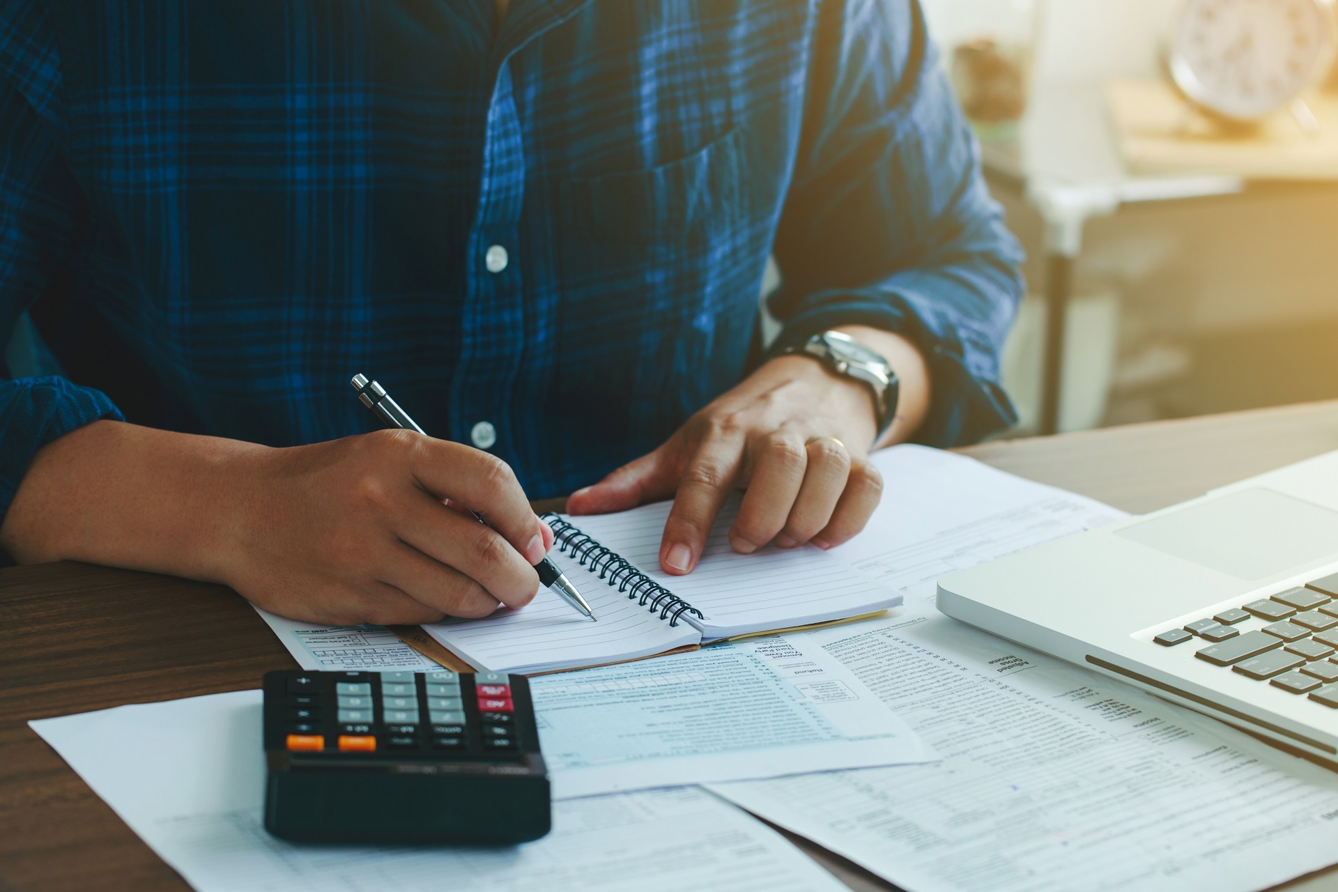 Man Doing Finances And Calculate About Cost Investment | Family Estate Planning​​ | Legacy Law Group