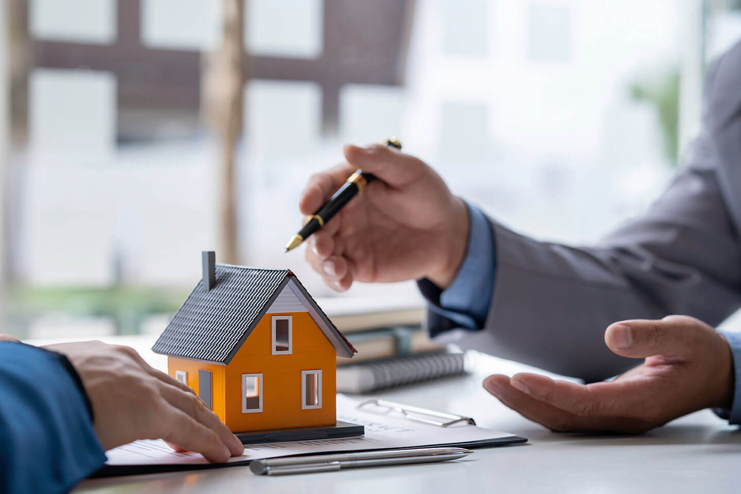 Two Men Discussing About Real Estate Properties | Family Estate Planning​​ | Legacy Law Group