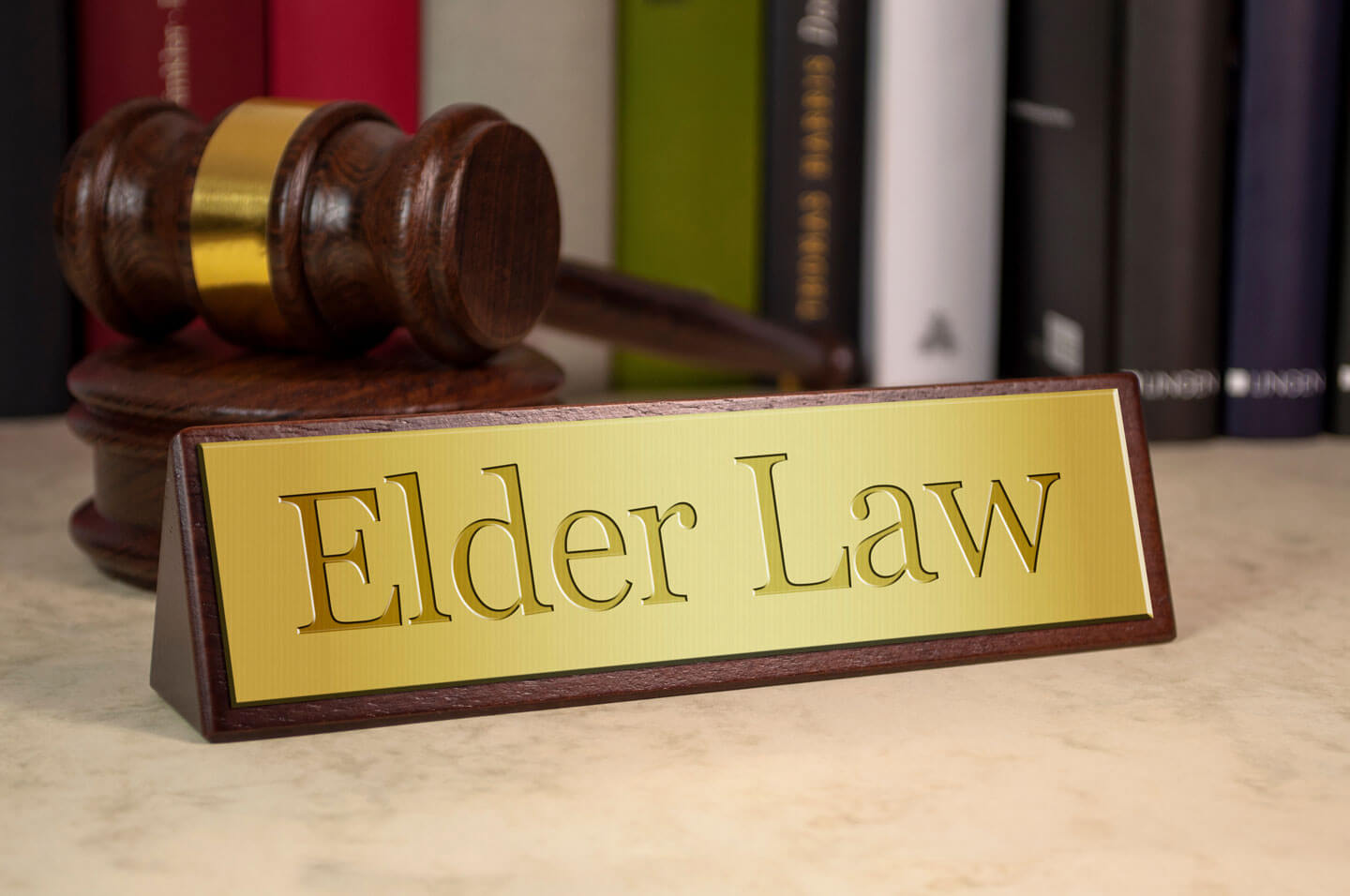 Golden Sign of Elder Law with Gavel & Books | Estate Planning Law Firm​ | Legacy Law Group