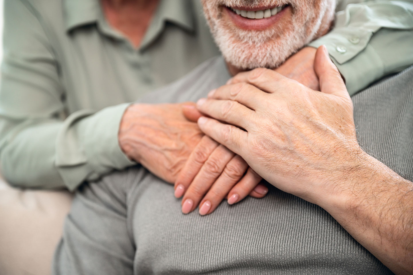 Senior Couple Hands and Sincere Hugging | Estate Planning Law Firm​ | Legacy Law Group