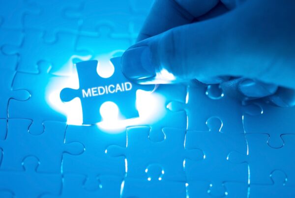 Medicaid written on a puzzle piece